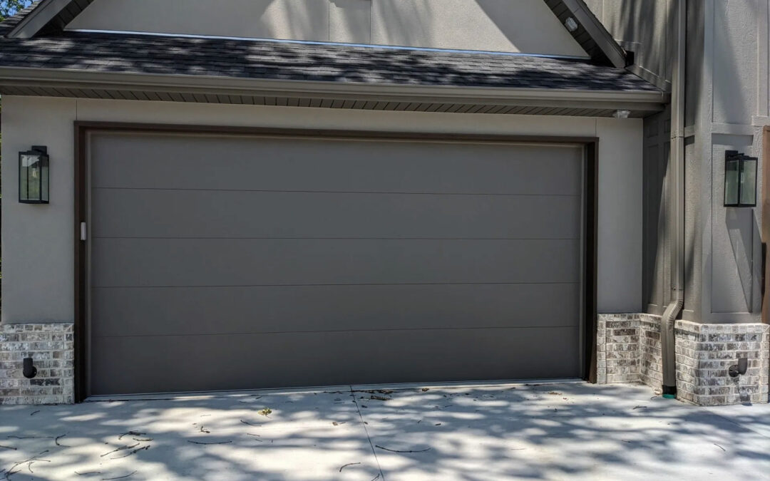 a gray garage door on a house