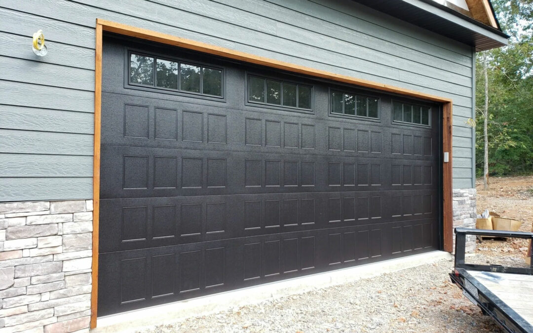 a black garage door with a lot of windows