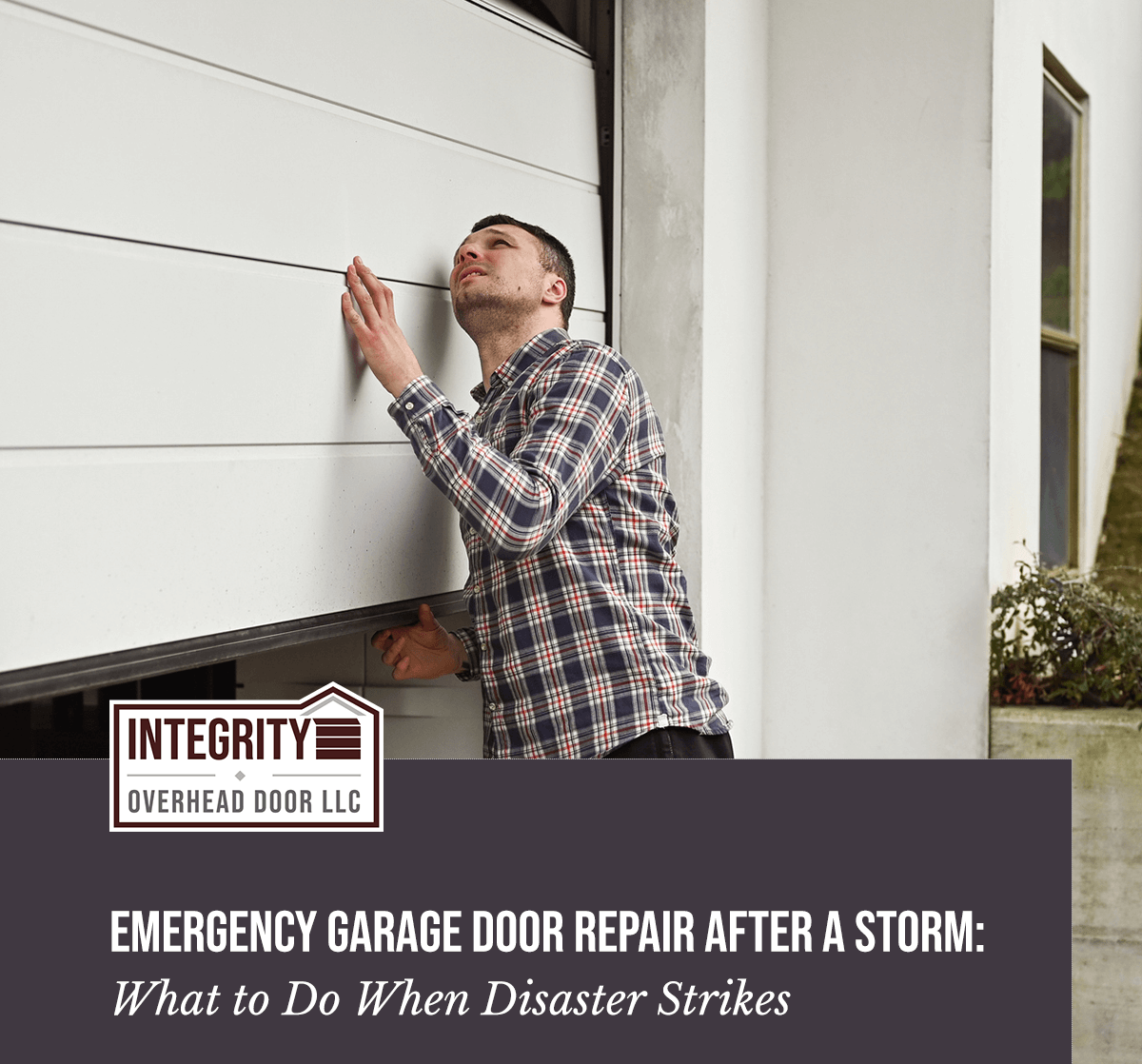 Man looking at broken garage door after a storm